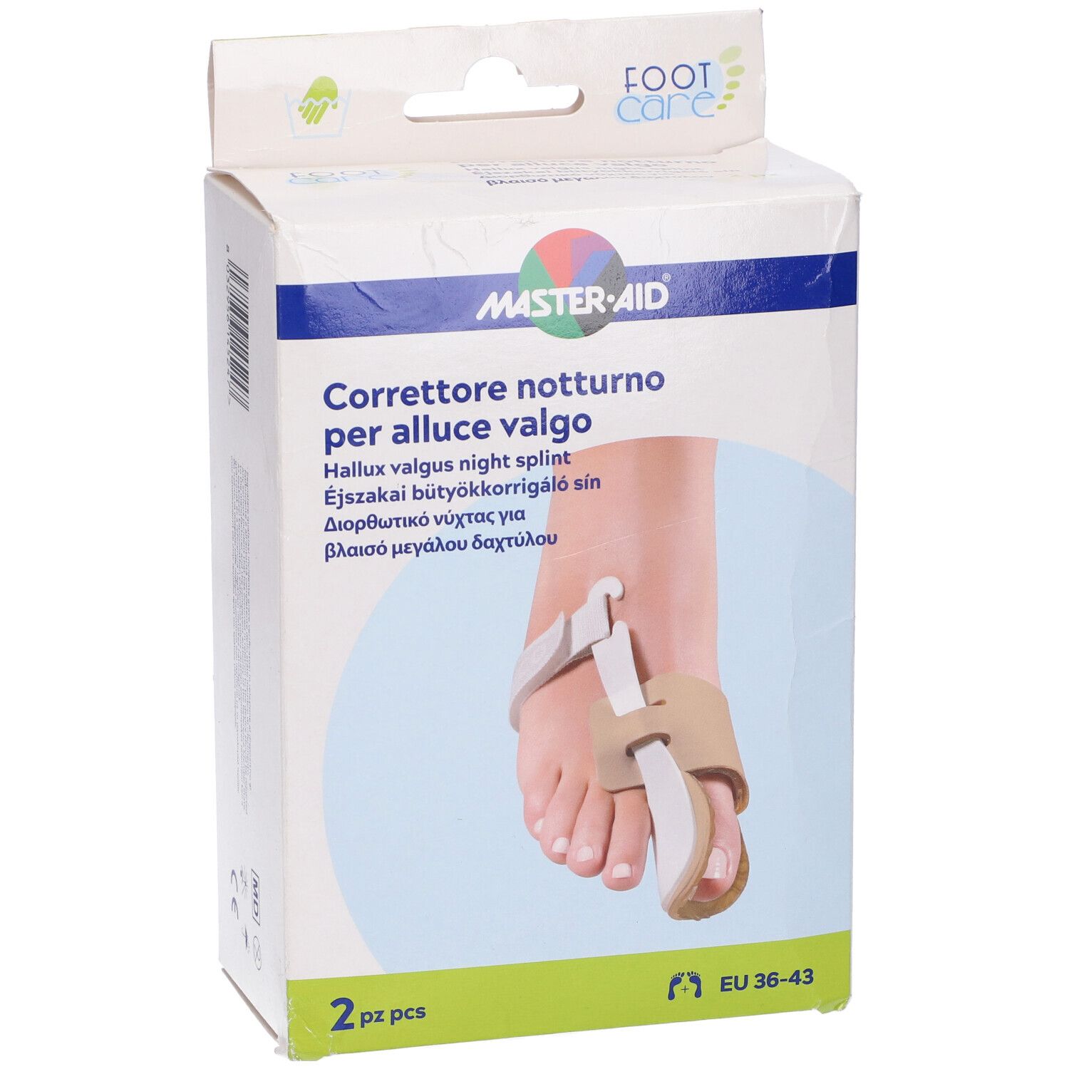 Confezione del prodotto. Sulla scatola è raffigurato un piede con tutore per alluce valgo. Marca: Master-Aid Footcare. Taglia: EU 36-43. 2 pezzi.