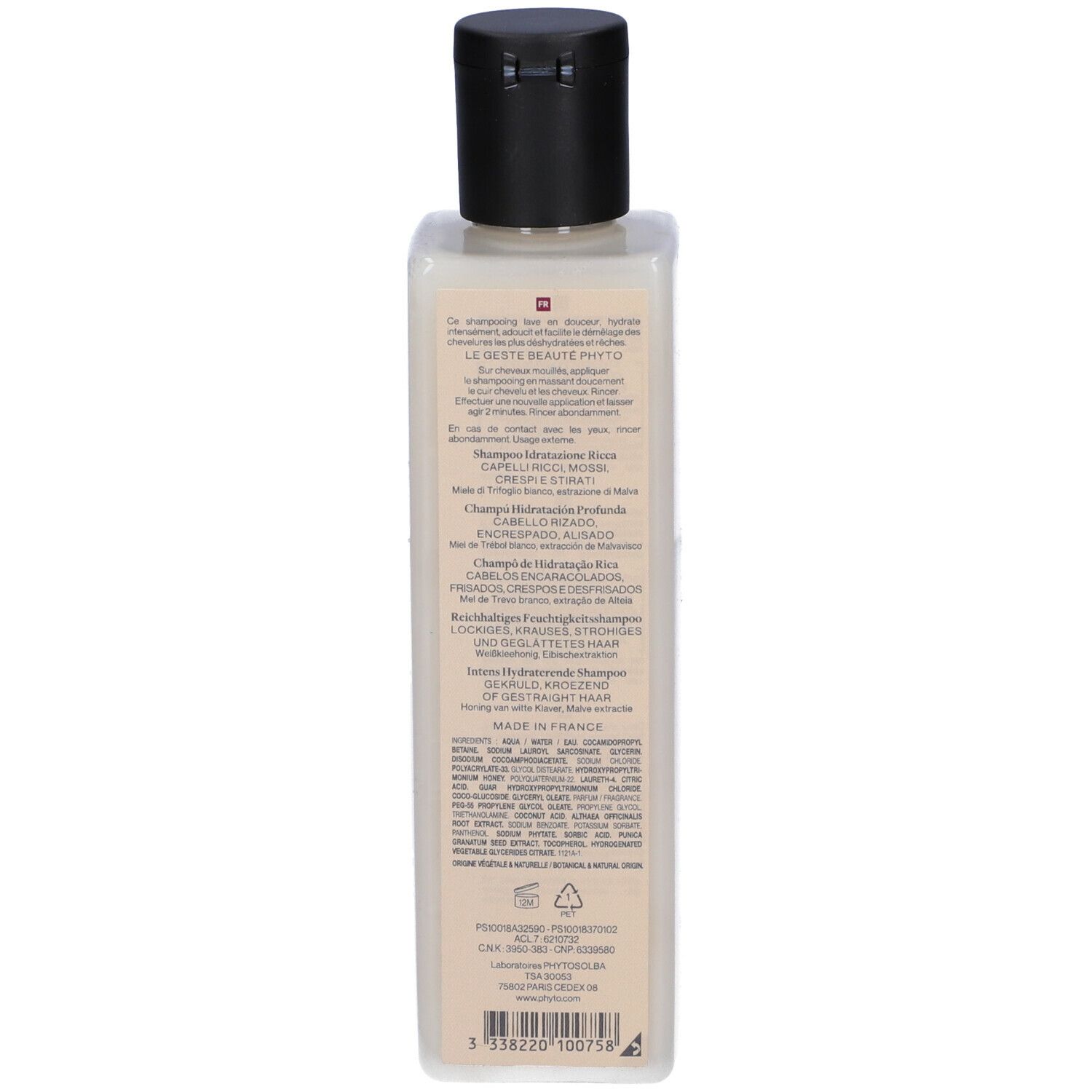Retro del flacone di shampoo. Testo multilingue. Forma quadrata, tappo nero.
