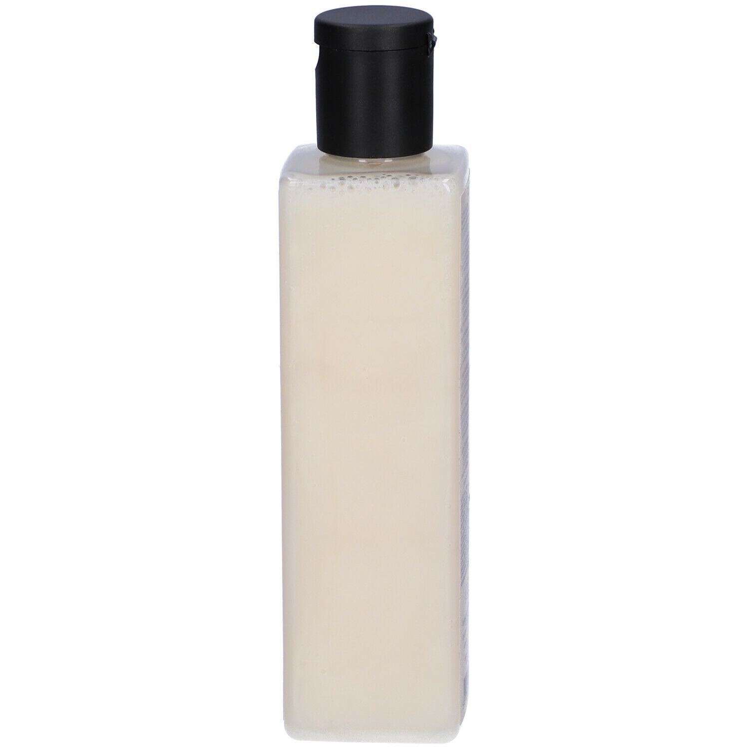 Flacone di shampoo beige con tappo nero. Forma quadrata.