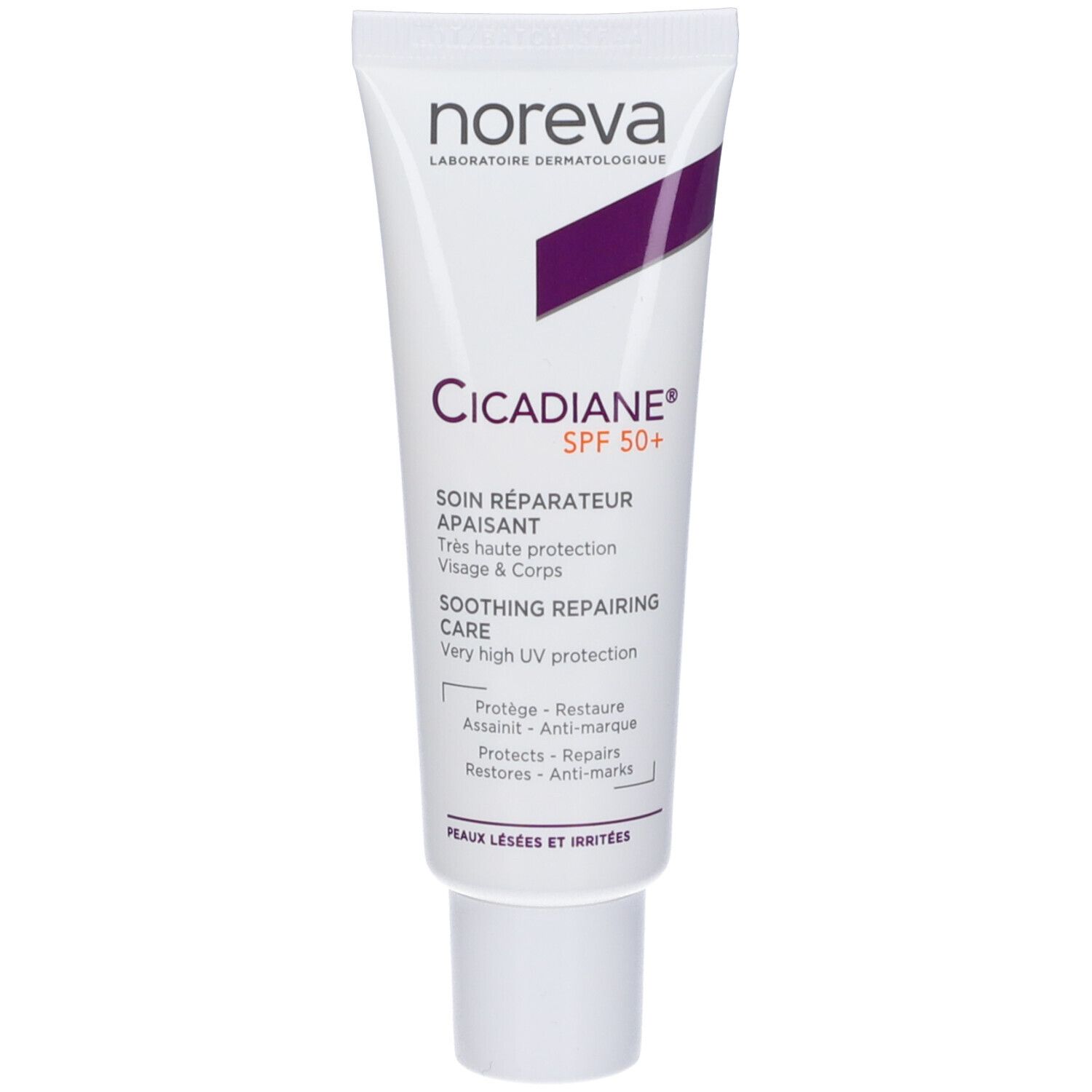 Tubo bianco con nome del prodotto e accento viola. Testo: Cicadiane SPF50+, trattamento riparatore lenitivo. Viso & Corpo.