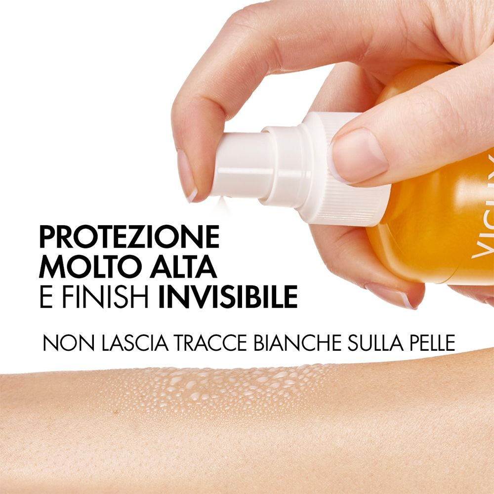 Vichy Capital Soleil Sonnenspray braun LSF 50. Sprühflasche auf Arm gesprüht. Text: Protezione molto alta e finish invisibile.