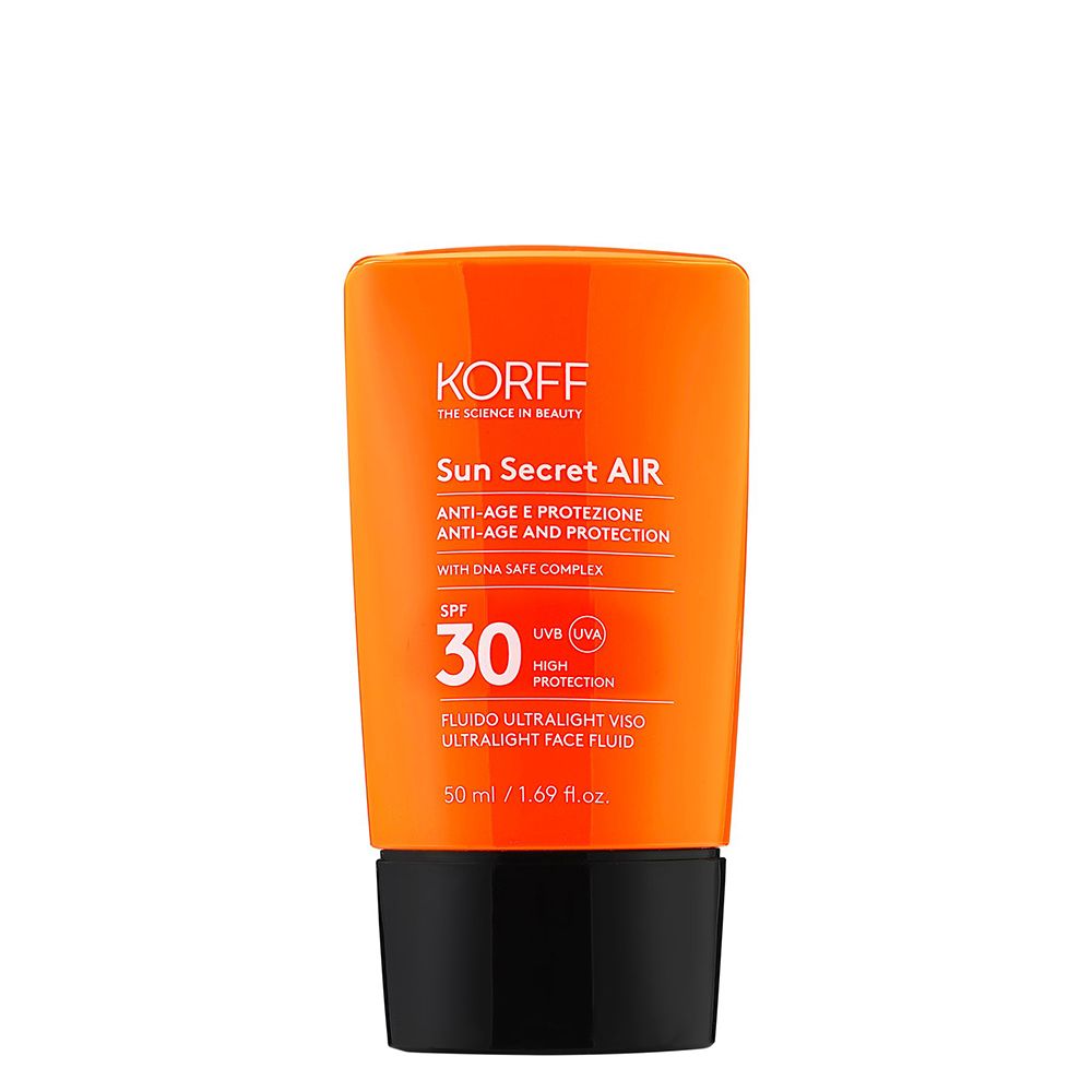 Flacone arancione con tappo nero. Scritta: Korff Sun Secret Air SPF 30. Fluido Ultralight Face Fluid.