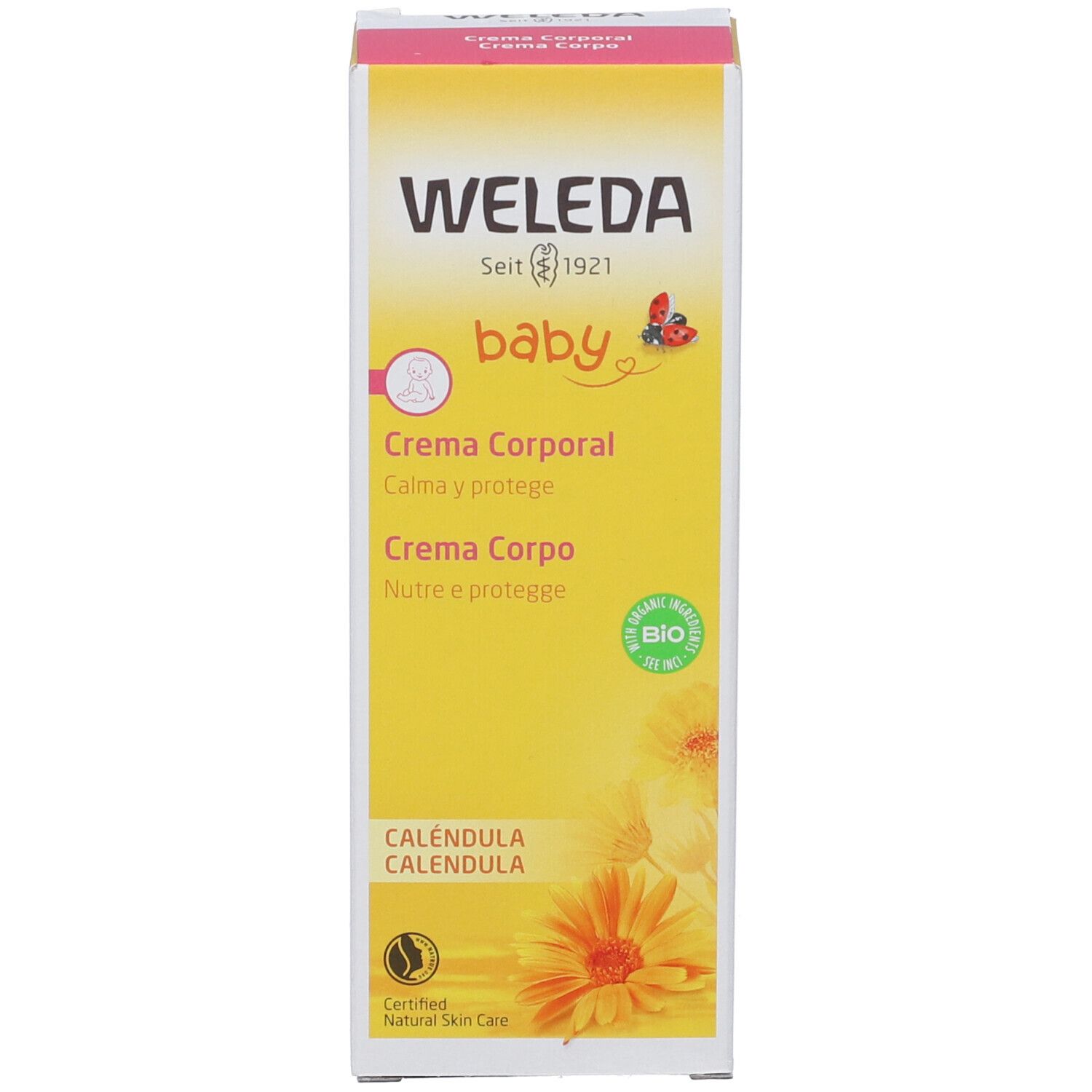 Hohe, gelbe Schachtel. Aufschrift: WELEDA, baby, Crema Corporal, Calendula. Logo: Ringelblume, Bio-Siegel.