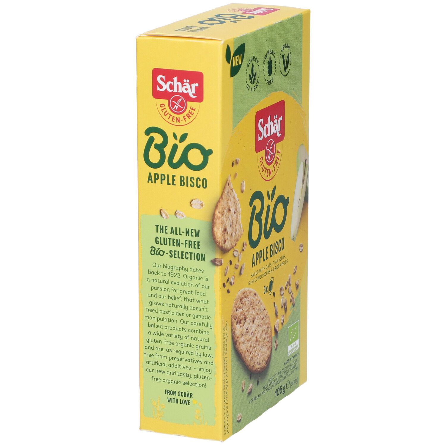 Scatola gialla "Schär Bio Apple Bisco". Senza glutine, vegano. Testo: "The all-new gluten-free Bio-Selection". 105g.