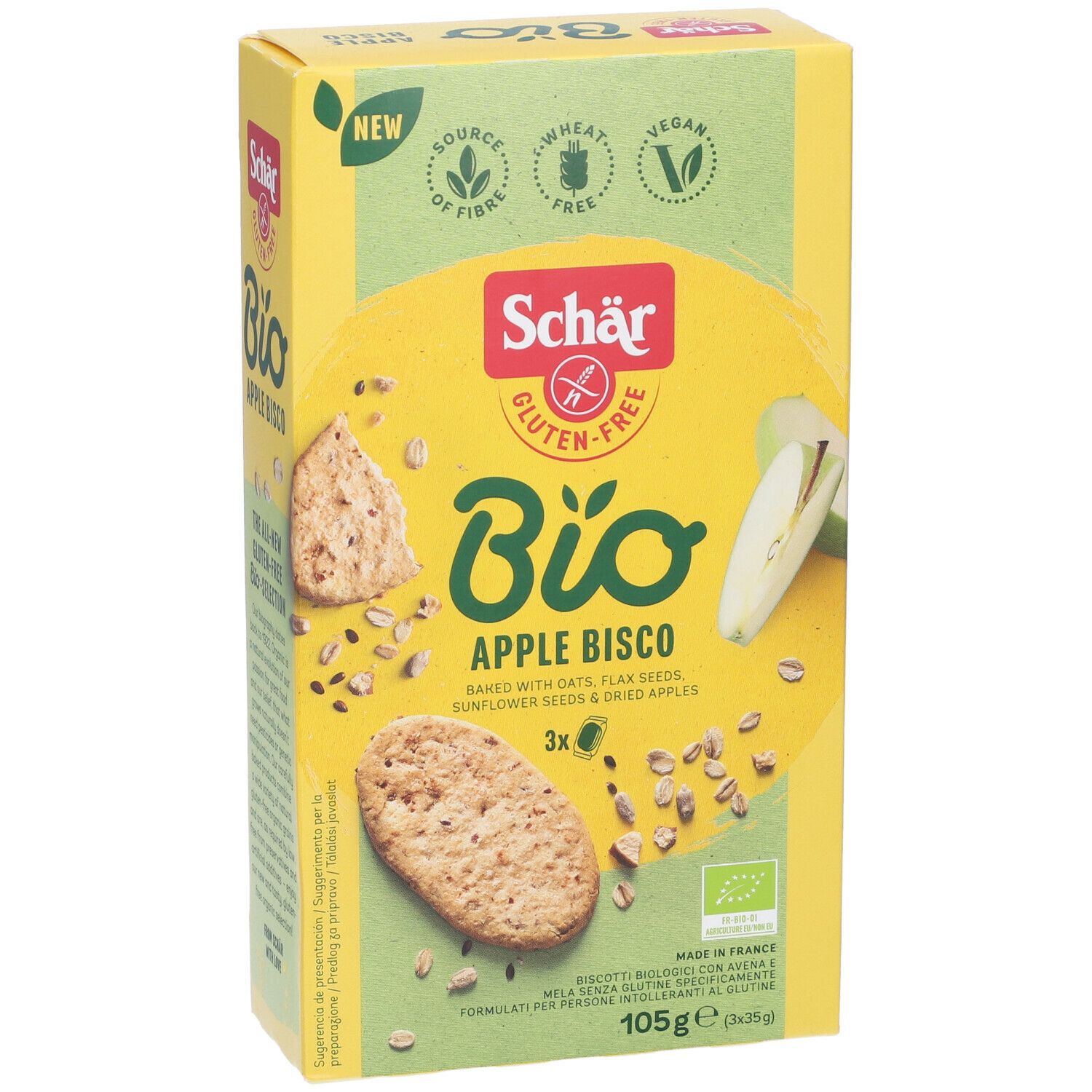 Scatola gialla "Schär Bio Apple Bisco". Senza glutine, vegano. Biscotti, pezzi di mela e semi illustrati. 105g.