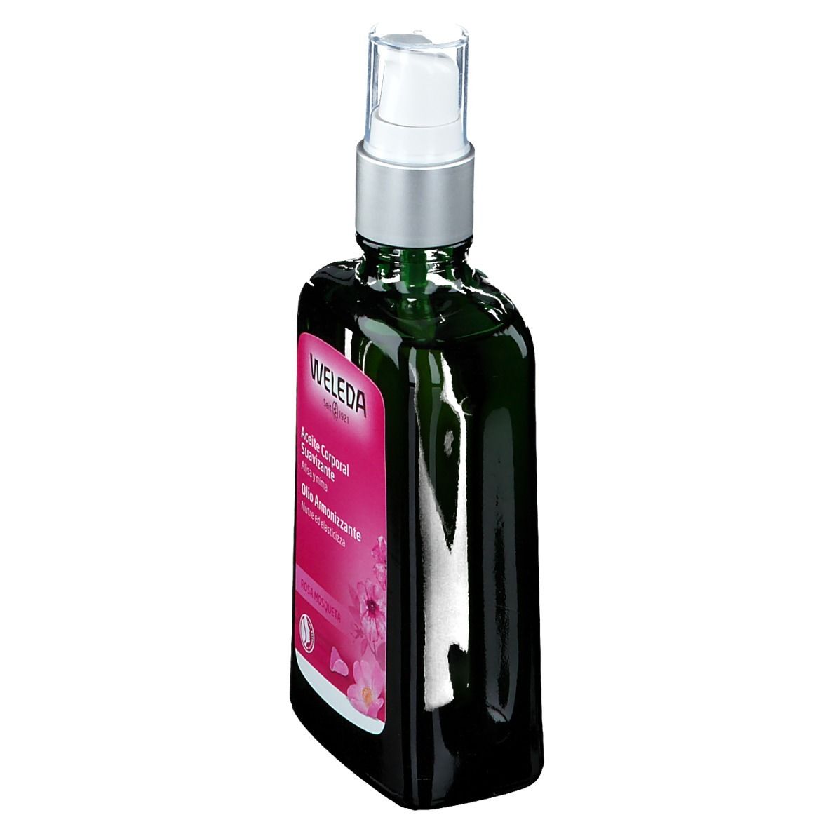 Weleda-Flasche. Grüne Glasflasche mit Sprühkopf. Rosa Etikett mit Produktinformationen.