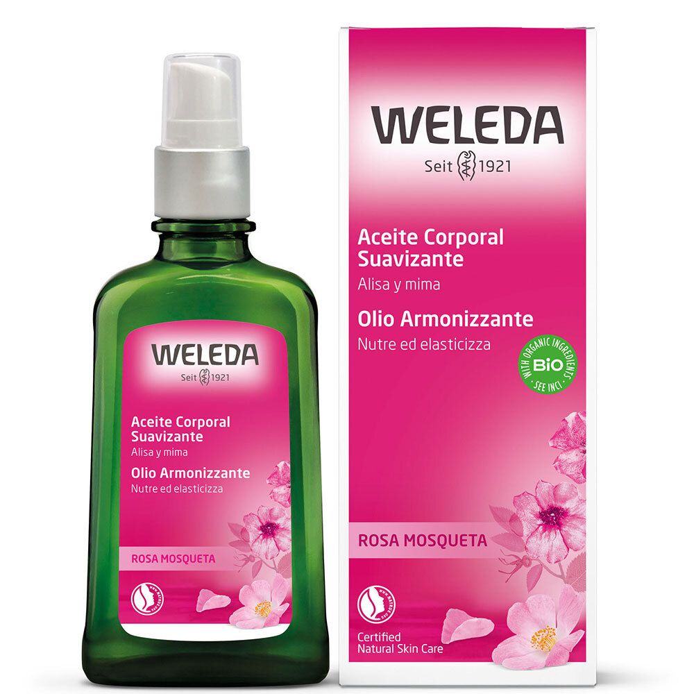 Weleda-Flasche und Verpackung. Grüne Flasche mit Sprühkopf. Rosa Verpackung mit Produktinformationen.