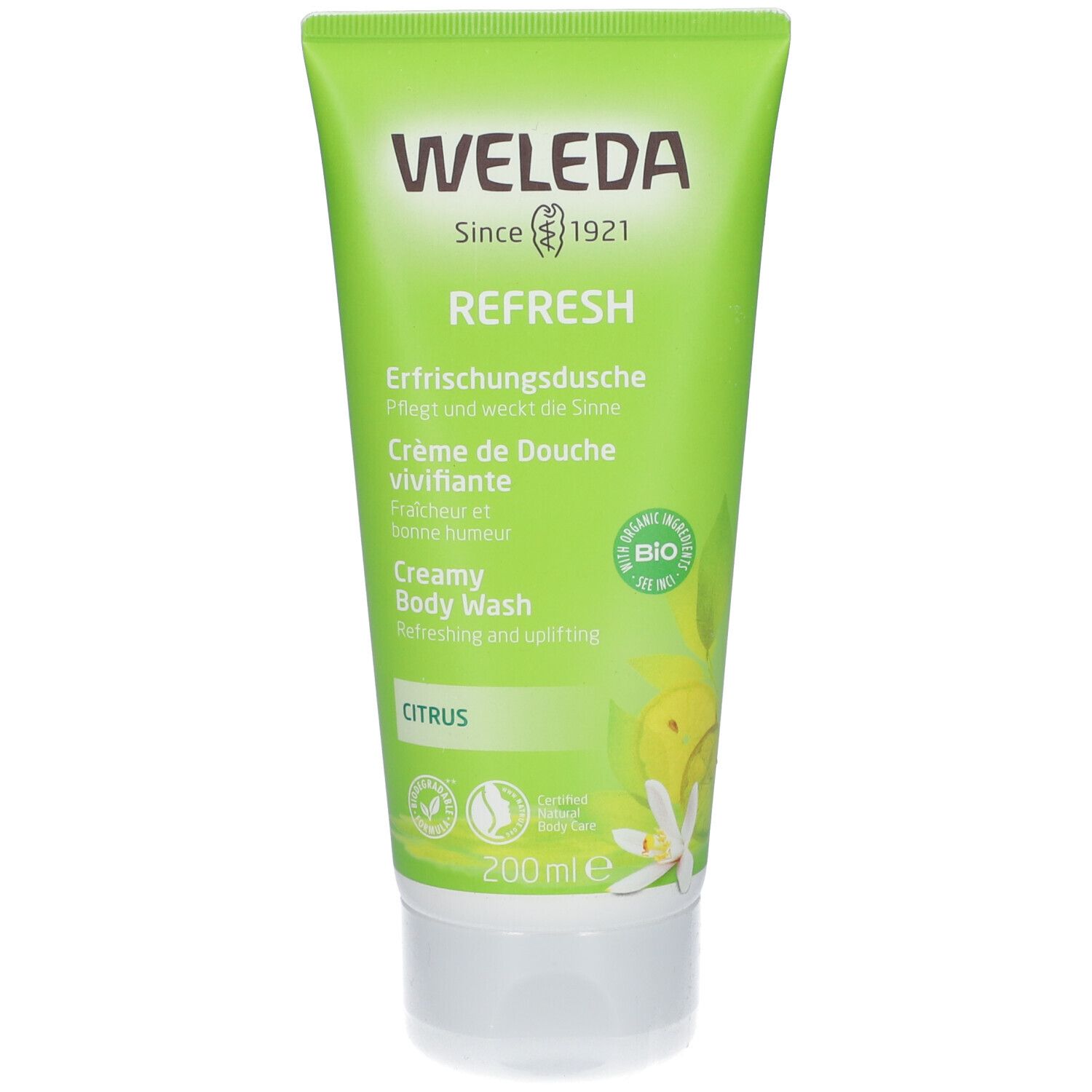 Grüne Tube mit weißem Verschluss. Aufschrift: WELEDA, REFRESH, Erfrischungsdusche, 200ml. Bio-Zertifizierung.