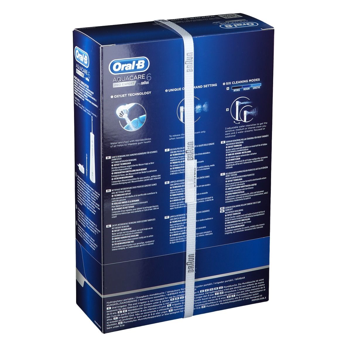 Verpackung Oral-B Aquacare 6 Pro-Expert. Blaue Box mit weißem Band. Rückseite mit Text und Produktabbildungen.
