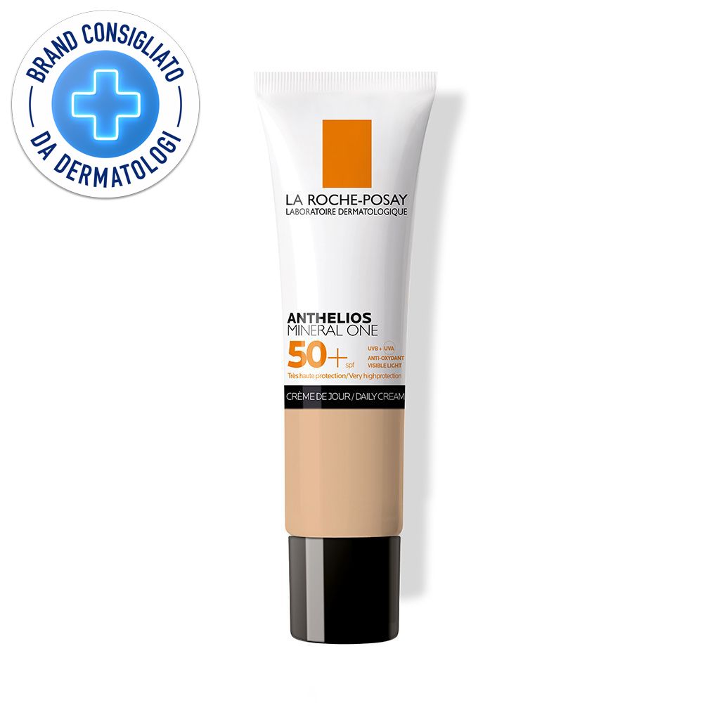 Tubo crema SPF 50+. Marchio e logo visibili. Testato dermatologicamente.