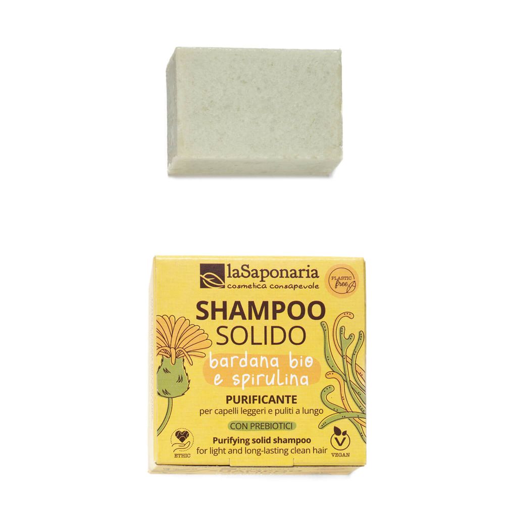 Shampoo solido rettangolare verde chiaro. Sotto, confezione gialla con nome e logo del prodotto.