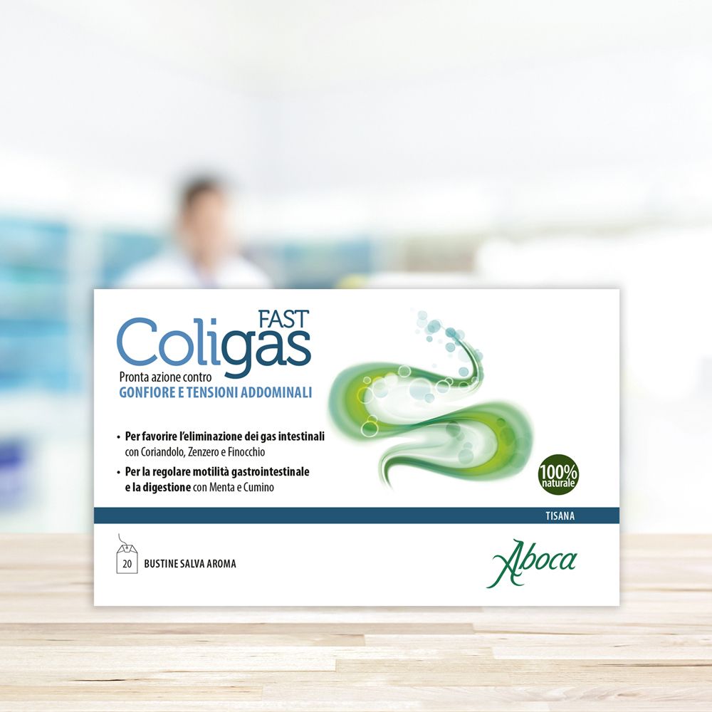 Aboca Coligas Fast Tisana-Packung auf einem Tisch. Produktname und grüne Illustrationen. 20 Beutel. 100% natürliche Inhaltsstoffe.