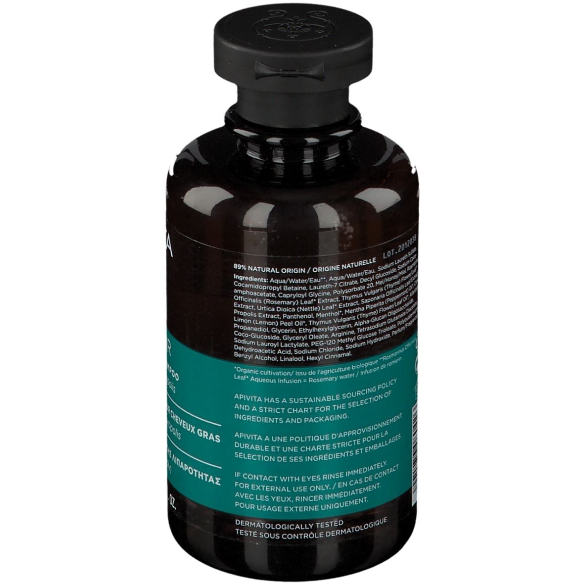 Dos d'un flacon brun avec bouchon noir. Texte sur étiquette turquoise et fond blanc. Ingrédients.