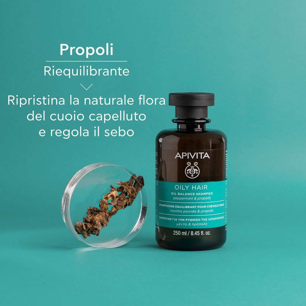 Flacon et Propoli. Texte: Propoli Riequilibrante, Restaure la flore naturelle du cuir chevelu et régule le sébum.