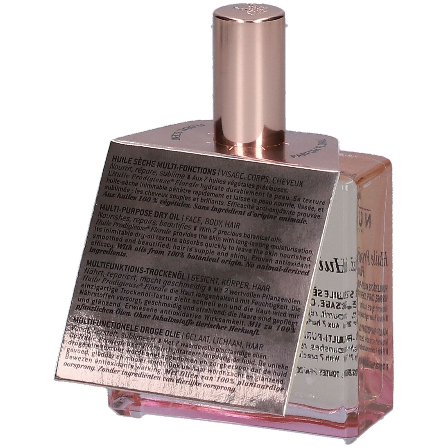 Flacone in vetro con olio rosato ed etichetta. Scritta: Nuxe Huile Prodigieuse Florale. Dettaglio ingredienti.