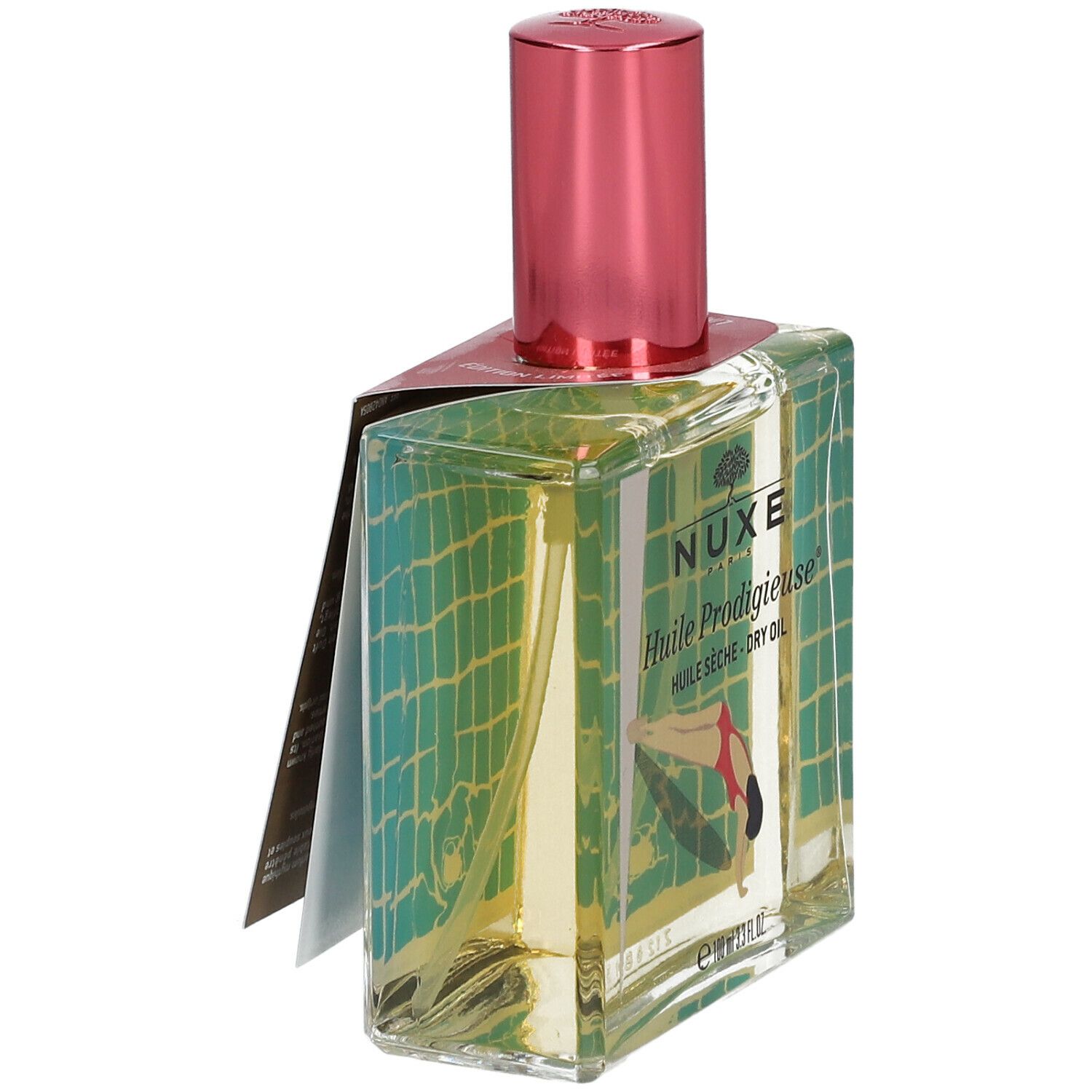 Glasflasche mit pinkfarbenem Deckel. Aufdruck: Nuxe Huile Prodigieuse, Frau beim Schwimmen. Grün-gelber Hintergrund. Etikett.