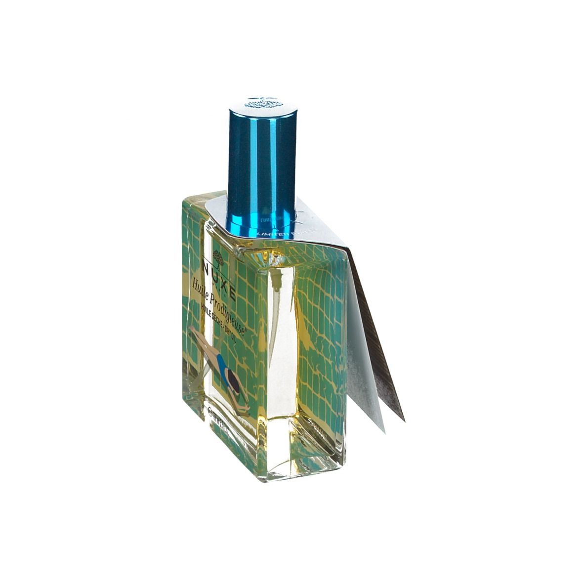 Flacone in vetro con tappo blu ed etichetta. Scritta: Nuxe Huile Prodigieuse. Etichetta parzialmente visibile.