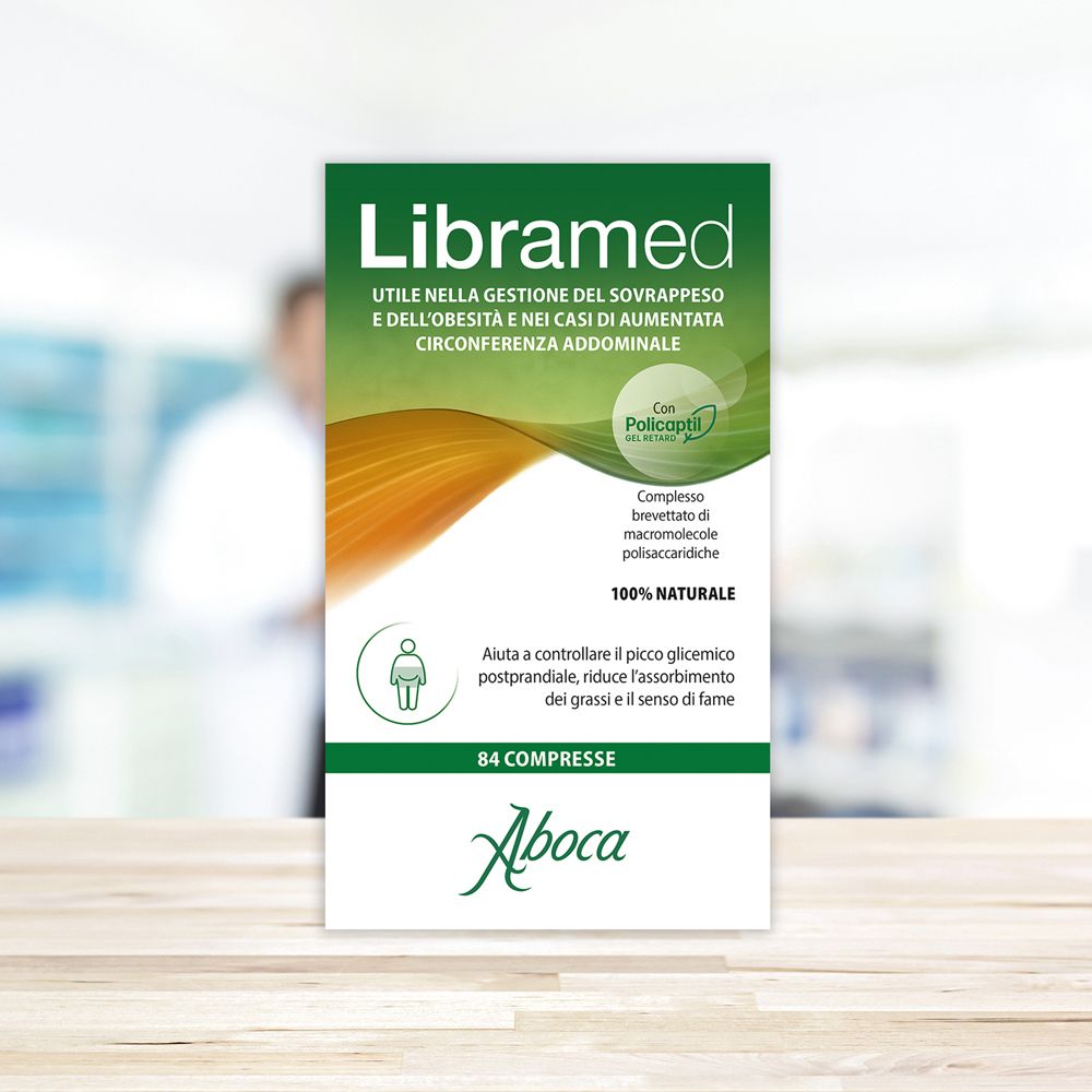 Libramed-Verpackung. Grün-weißes Design. Text: '84 compresse'. Aboca-Logo. Hintergrund unscharf.