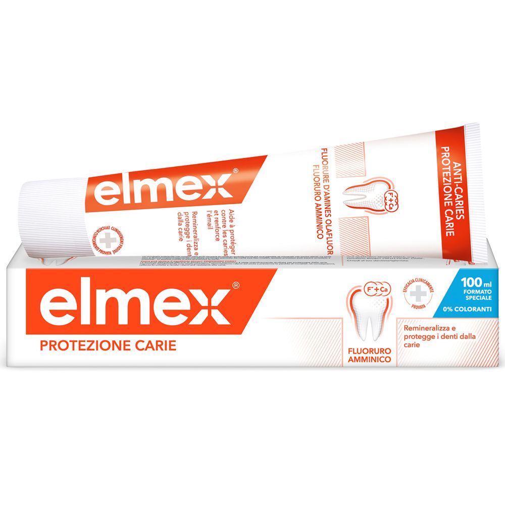 Dentifricio Elmex Protezione Carie e confezione. Arancione e bianco. Contiene: Protezione Carie, 100ml, Fluoruro amminico, 0% coloranti.