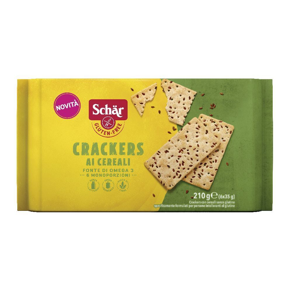 Confezione di Crackers ai Cereali Schär. Confezione giallo-verde con cracker e nome del prodotto. Sigillo senza glutine.