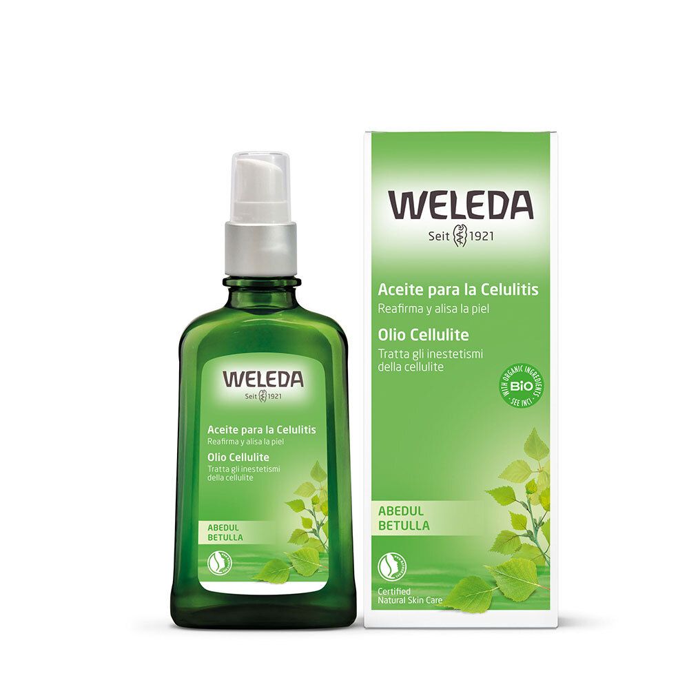 Flacone di vetro verde con vaporizzatore e confezione. Nome e logo del prodotto visibili.