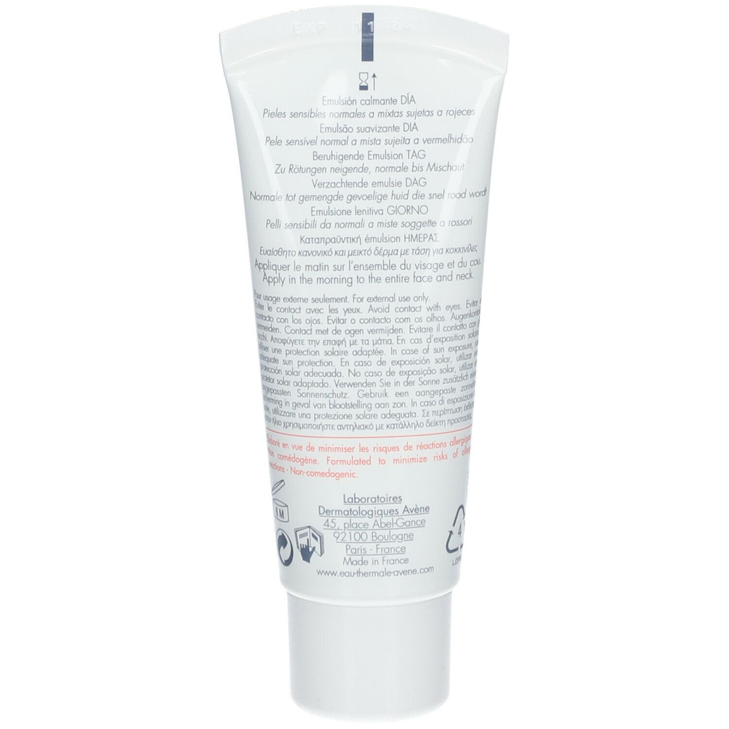 Dos du tube blanc avec texte en plusieurs langues. Contient des informations sur le produit.