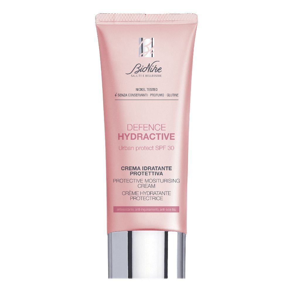 Tubo rosa con testo bianco. Contiene "Defence Hydractive Urban Protection SPF 30". Marchio: BioNike.