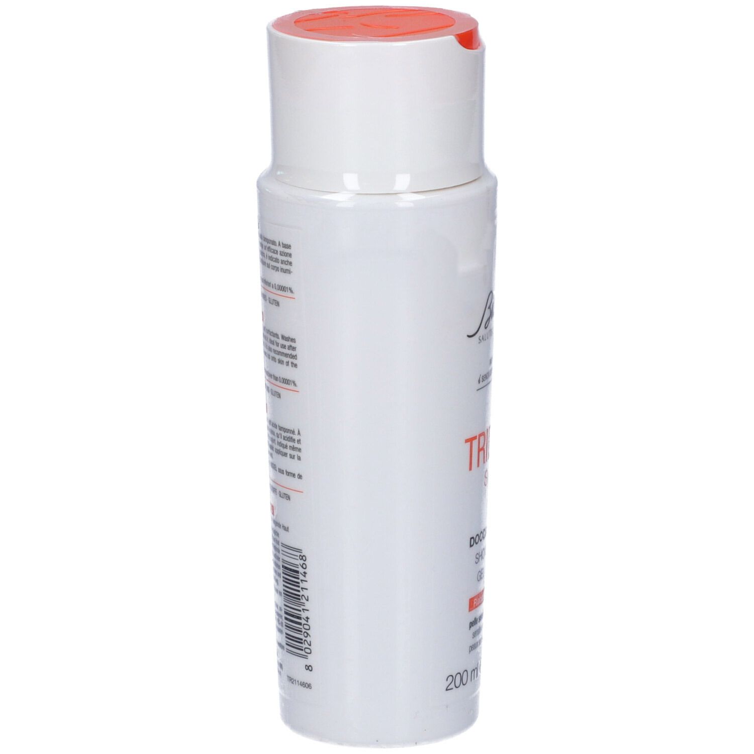Flacon blanc avec bouchon orange. Inscription: Triderm Syndet, gel douche. Texte au dos.