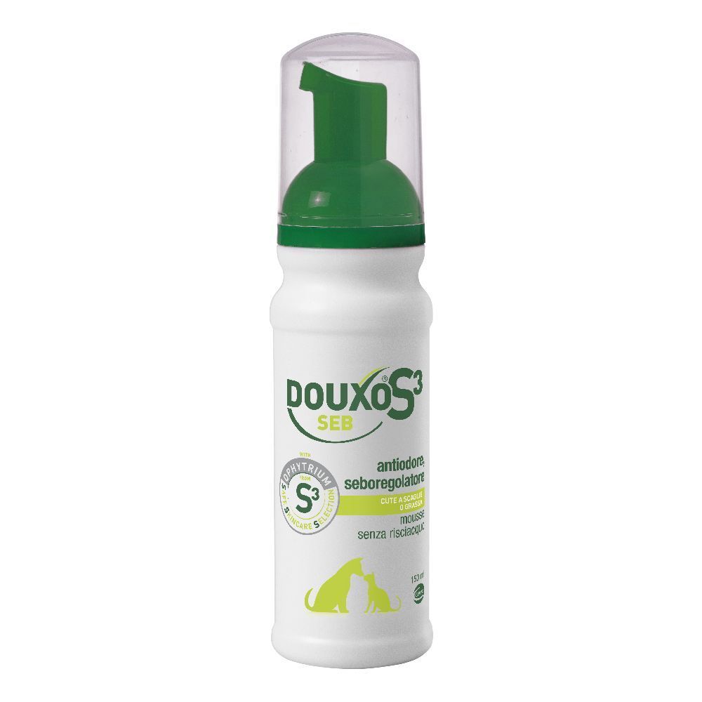 Flacone bianco con erogatore verde. Scritta DOUXO S3 SEB. Contiene mousse. Con immagine di animali.