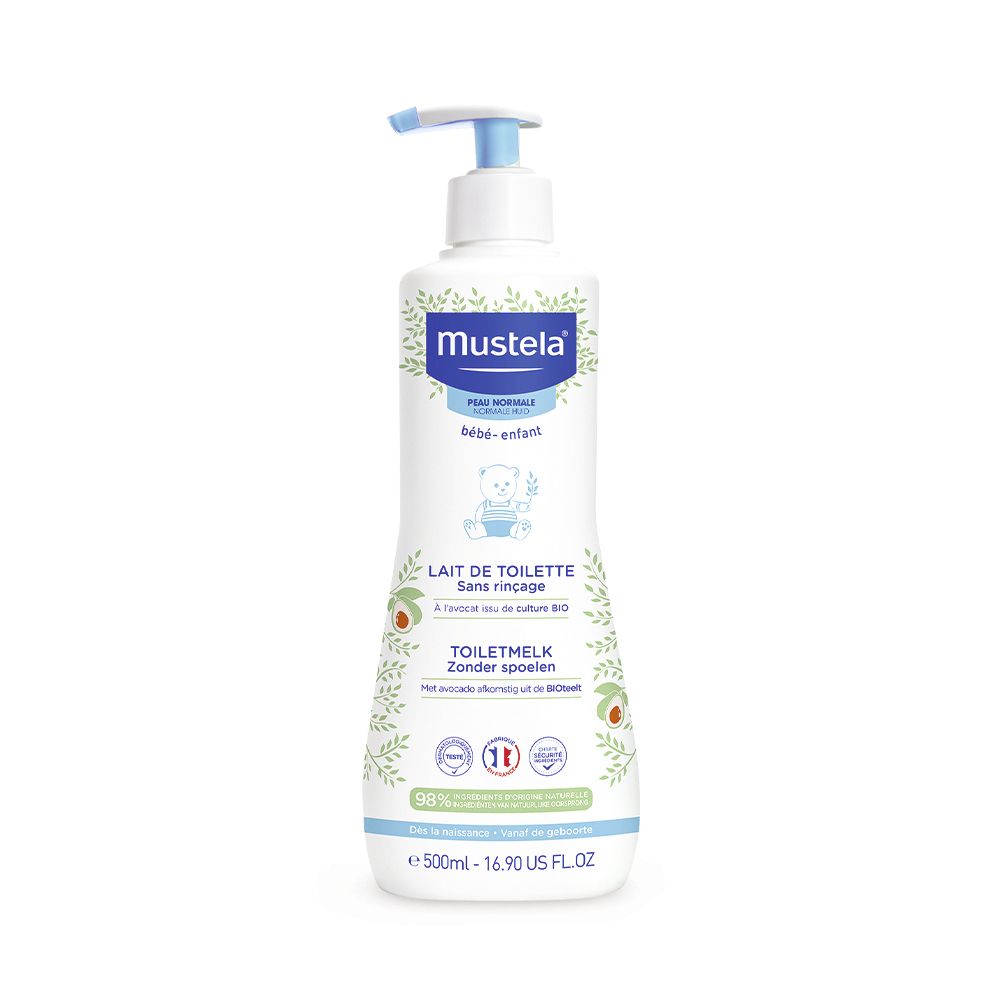 Flacone di latte detergente Mustela® con dosatore. Scritta: Lait de toilette, sans rinçage. Illustrazioni di avocado. 500ml.