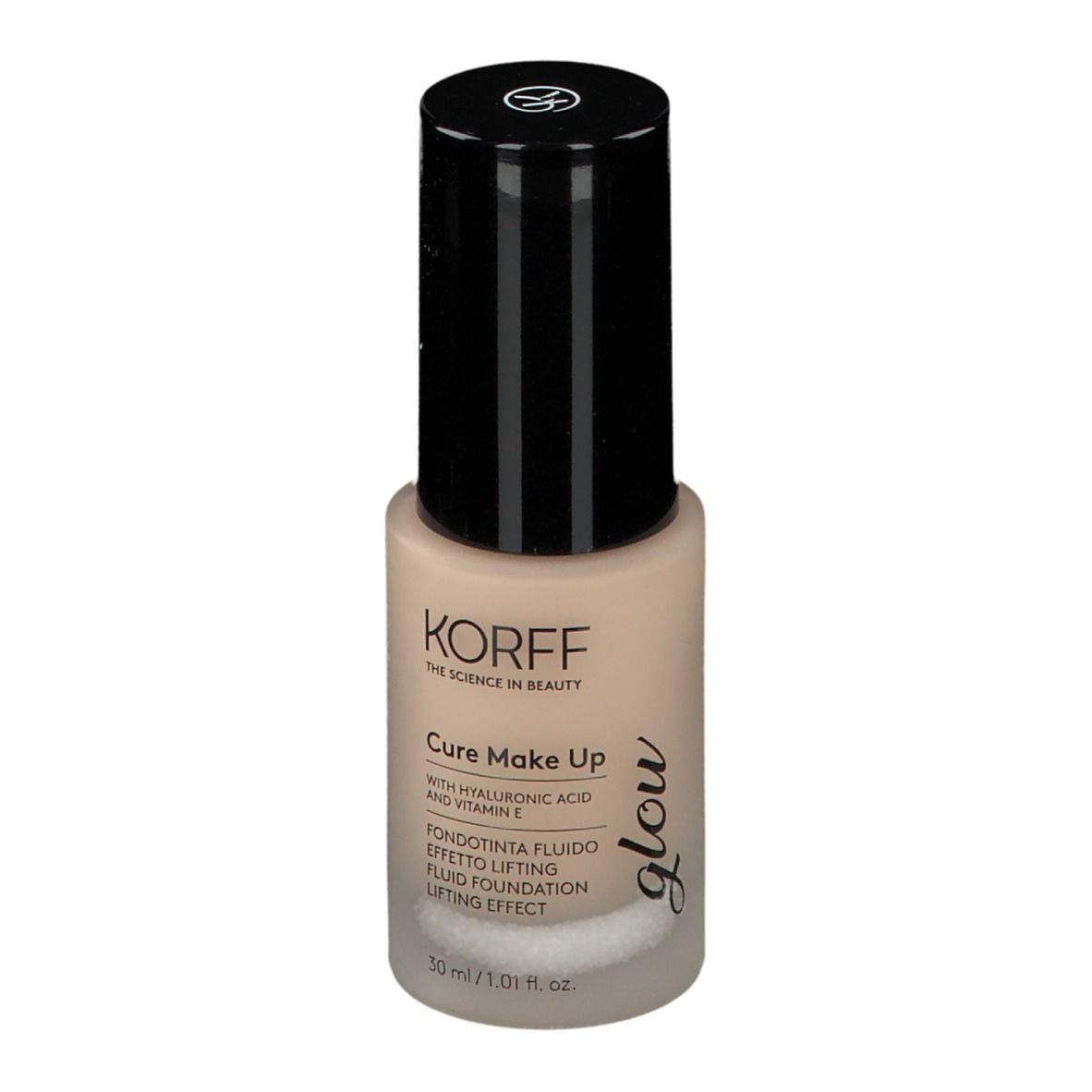 Flacon de fond de teint KORFF Cure Make Up avec bouchon noir. Inscription: Glow, Cure Make Up, 30 ml.