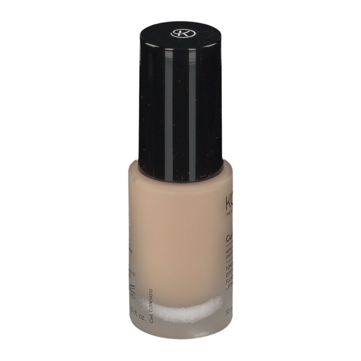 Fond de teint KORFF Cure Make Up, flacon avec bouchon noir. Inscription: Glow, Cure Make Up, 50 ml.