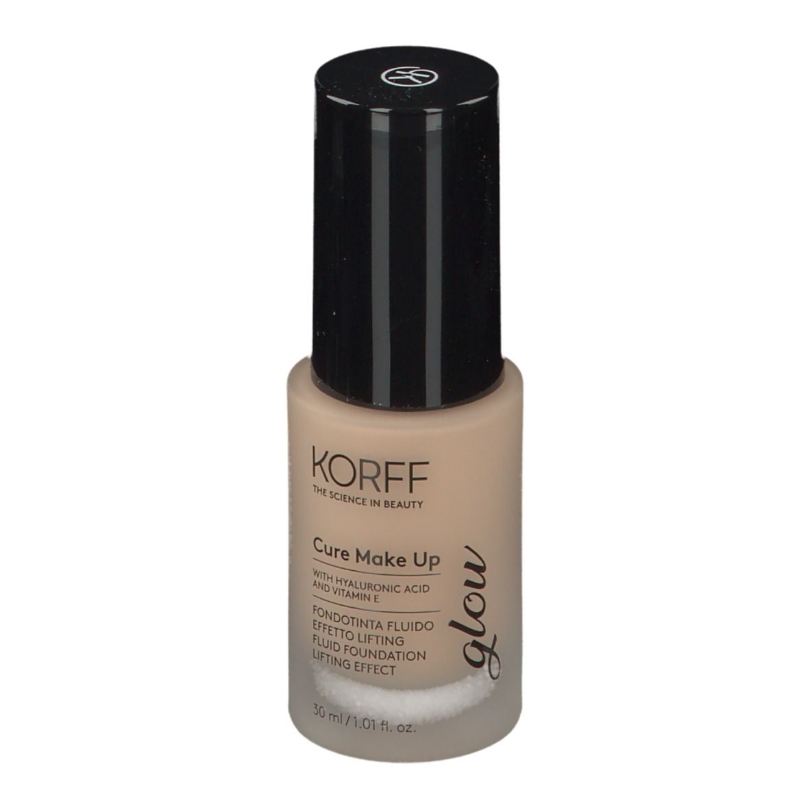 Fond de teint KORFF Cure Make Up, flacon avec bouchon noir. Inscription: Glow, Cure Make Up, 30 ml.