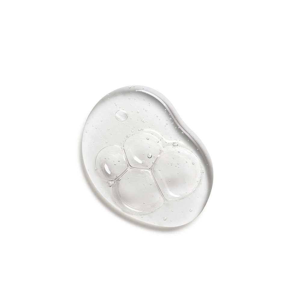 Klare Gel-Probe mit Blasen. Auf weißem Hintergrund.