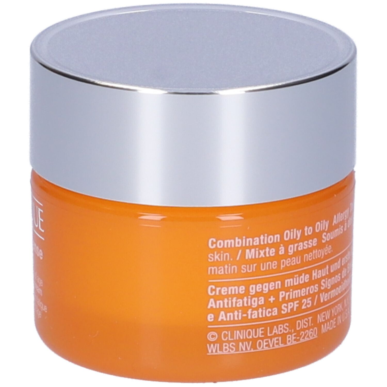 Vasetto arancione con coperchio argentato. Scritta: Clinique Superdefense SPF 25. Testo in inglese, tedesco, italiano, olandese e francese.