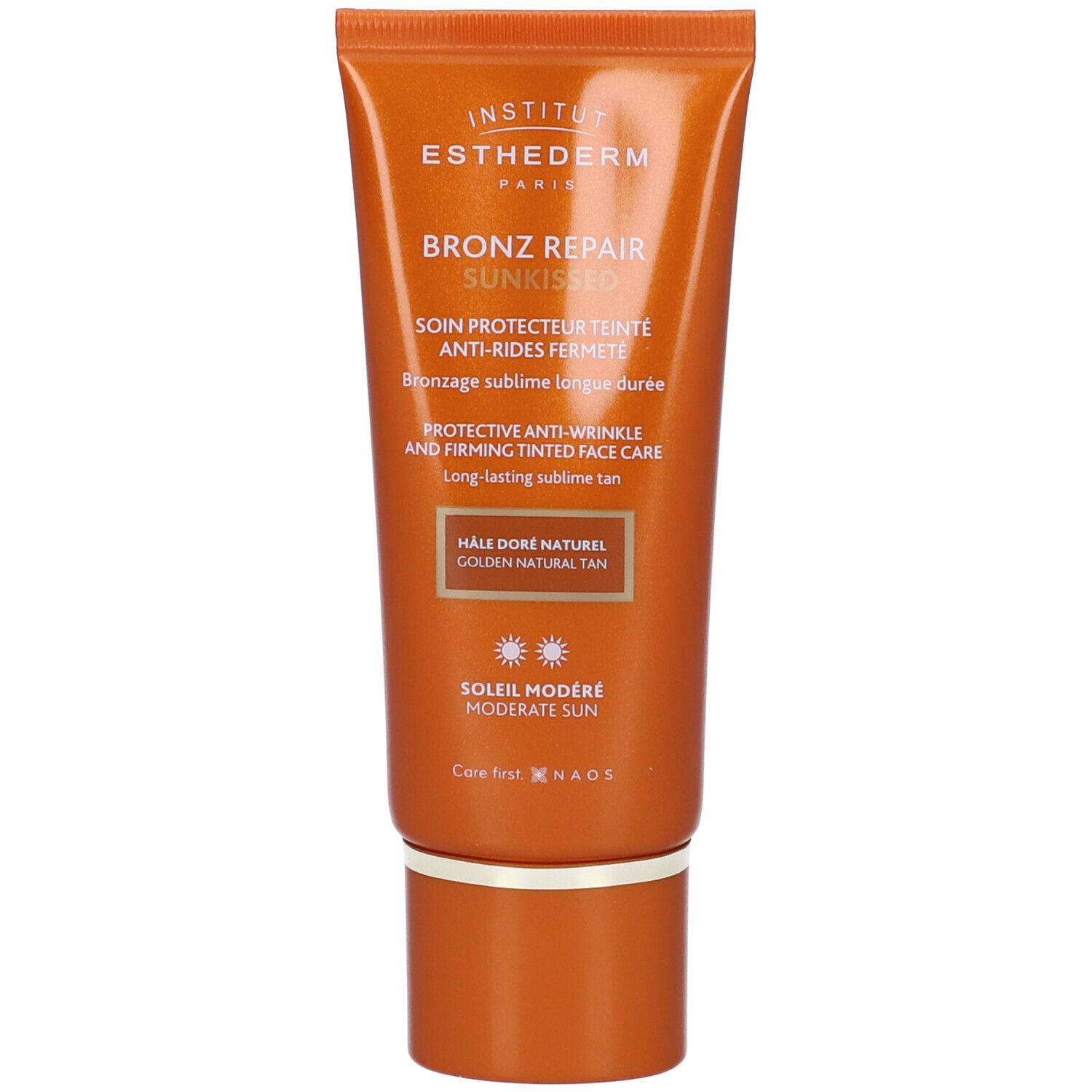 Orange Tube mit Sonnencreme. Text: Anti-Falten, getönt, Sonnenschutz. Marke: Institut Esthederm.