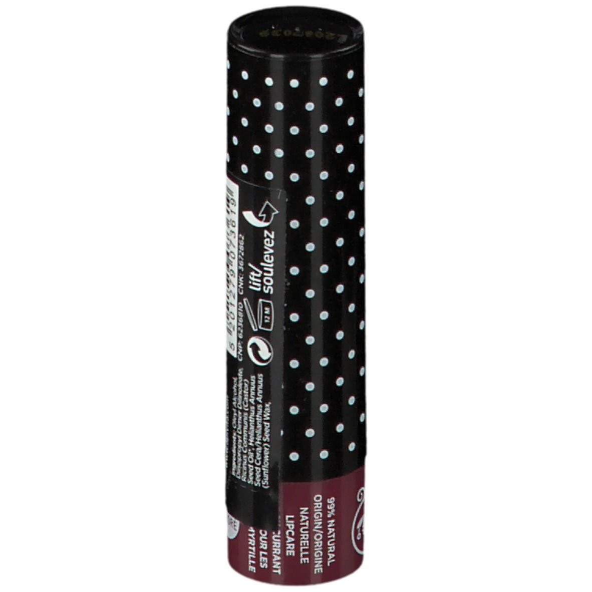 Retro stick balsamo labbra. Tappo nero a pois bianchi. Testo e simboli. Scritta: 99% NATURAL ORIGIN.