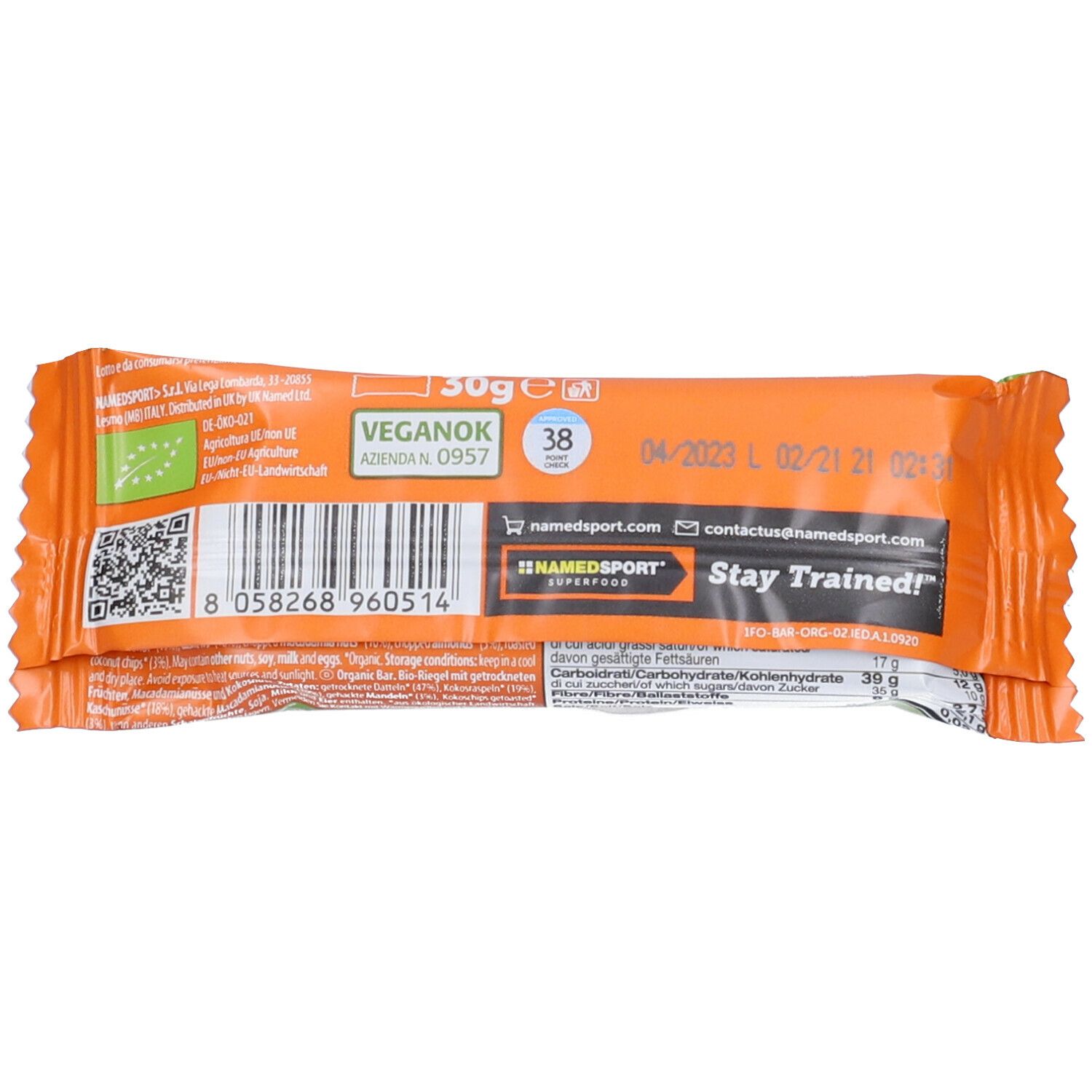 Retro della confezione di un NAMEDSPORT® OrganicBar. Sfondo arancione con testo e codice a barre.