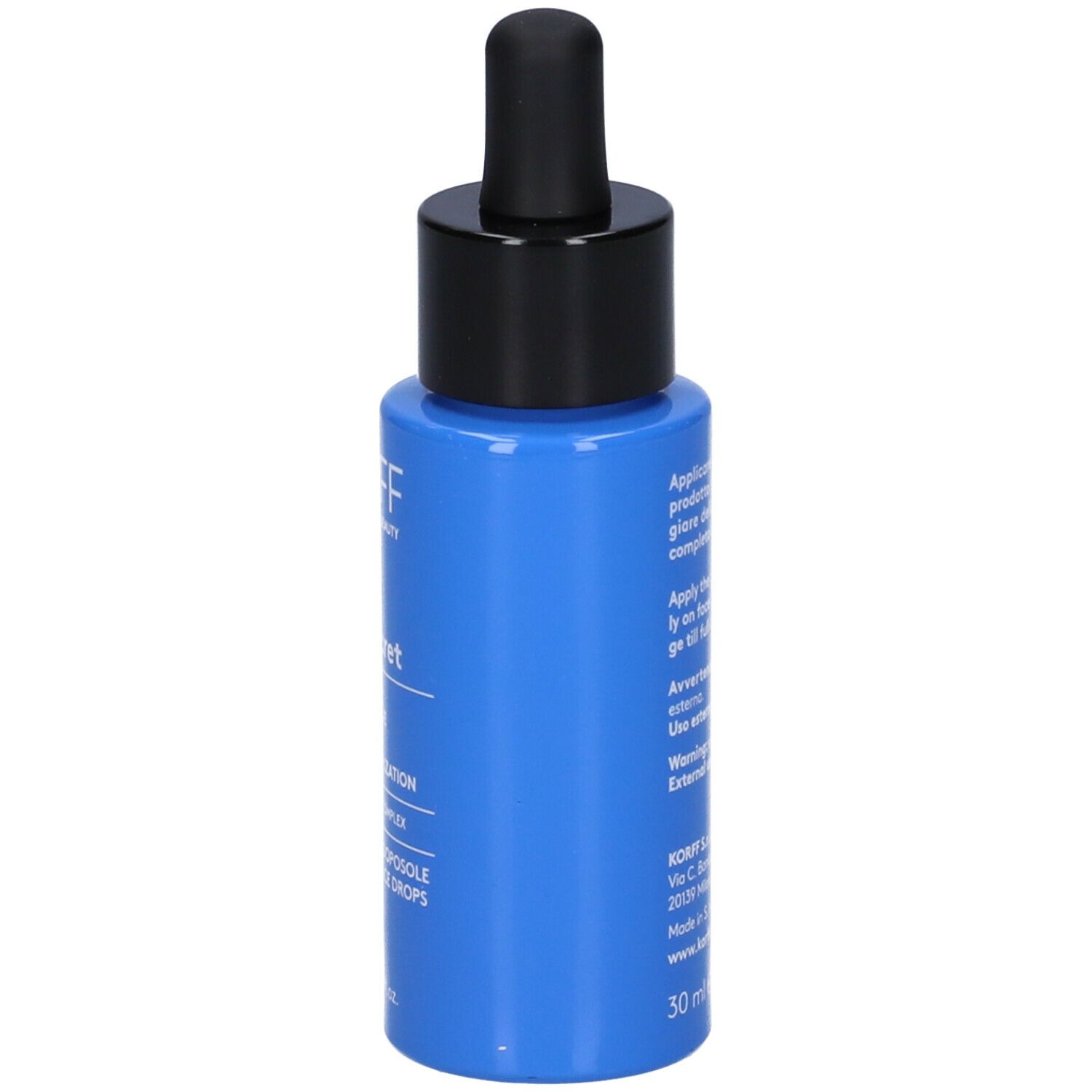 Flacone blu con tappo nero e pipetta. Scritta: Korff Sun Secret, Gocce Doposole. 30 ml.