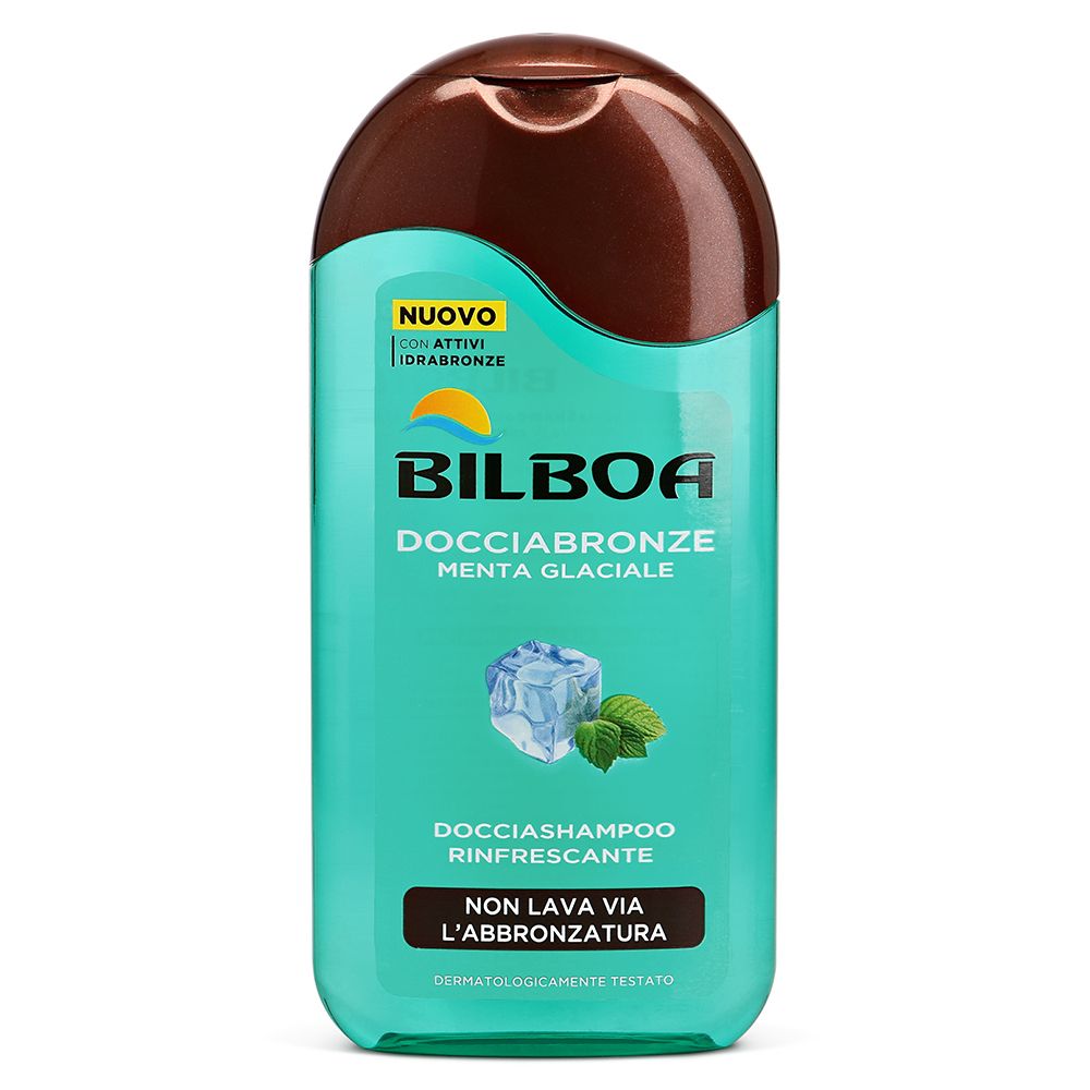 Flacone turchese e marrone. Scritta: Bilboa Docciabronze Menta. Grafica cubetto di ghiaccio e menta. "Nuovo" e "Non lava via l'abbronzatura". Dermatologicamente testato.