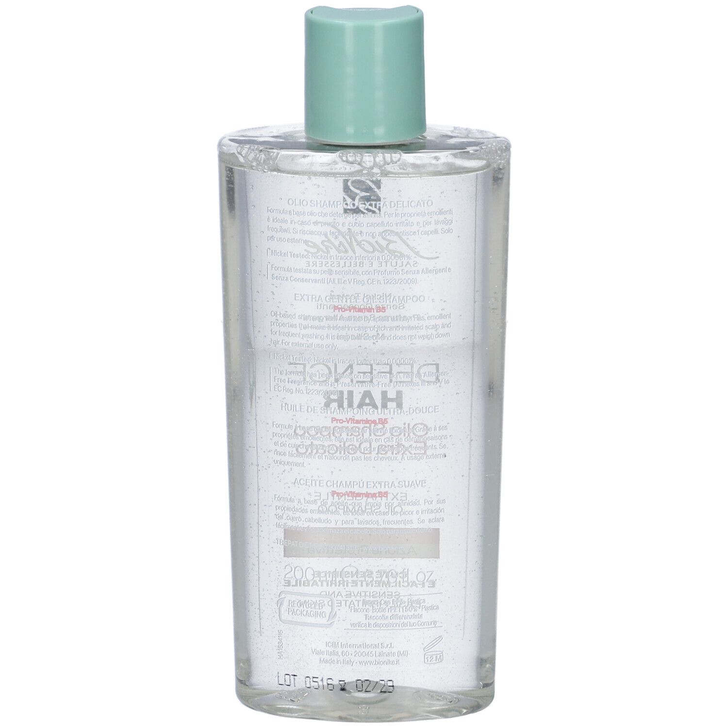 Flasche mit klarem Haarshampoo, türkisfarbenem Deckel und Etikett mit Produktinformationen.