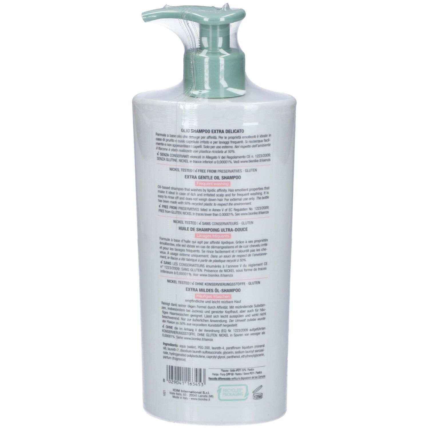 Retro del flacone di shampoo bianco con erogatore verde. Testo multilingue. Marchio Bionike.