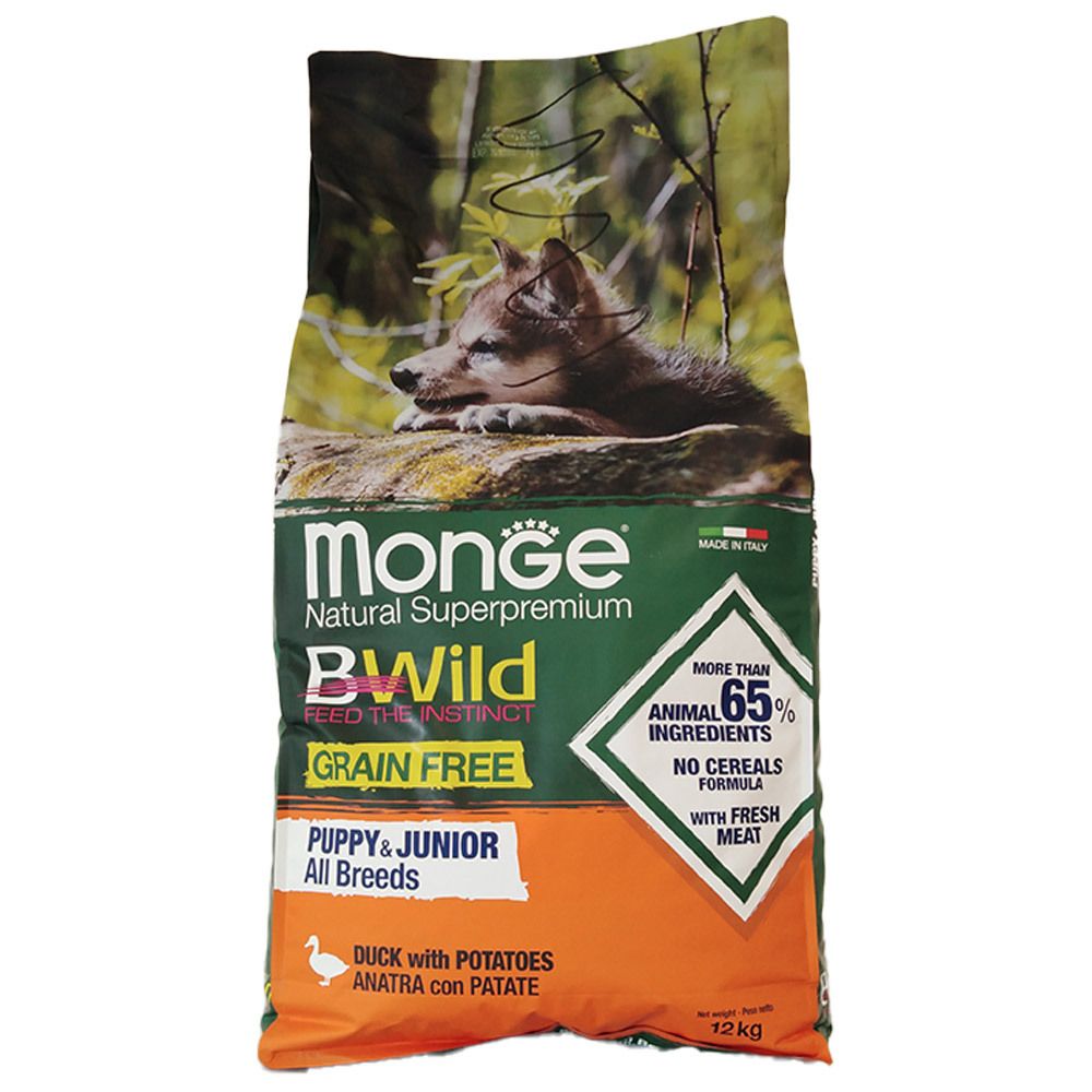 Monge BWild Puppy & Junior, senza cereali, 12 kg. Con anatra e patate. Confezione con foto cucciolo e informazioni prodotto.