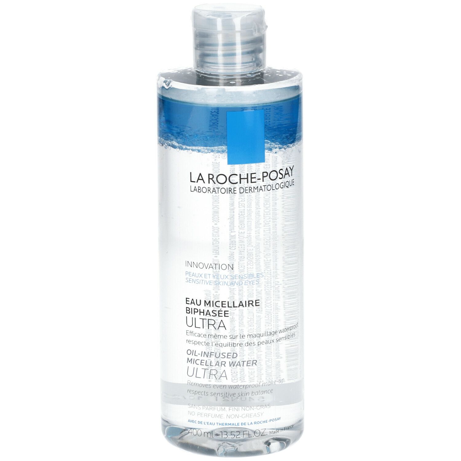 Flacone La Roche-Posay. Scritta "Eau Micellaire Biphasee Ultra". Liquido trasparente e blu.