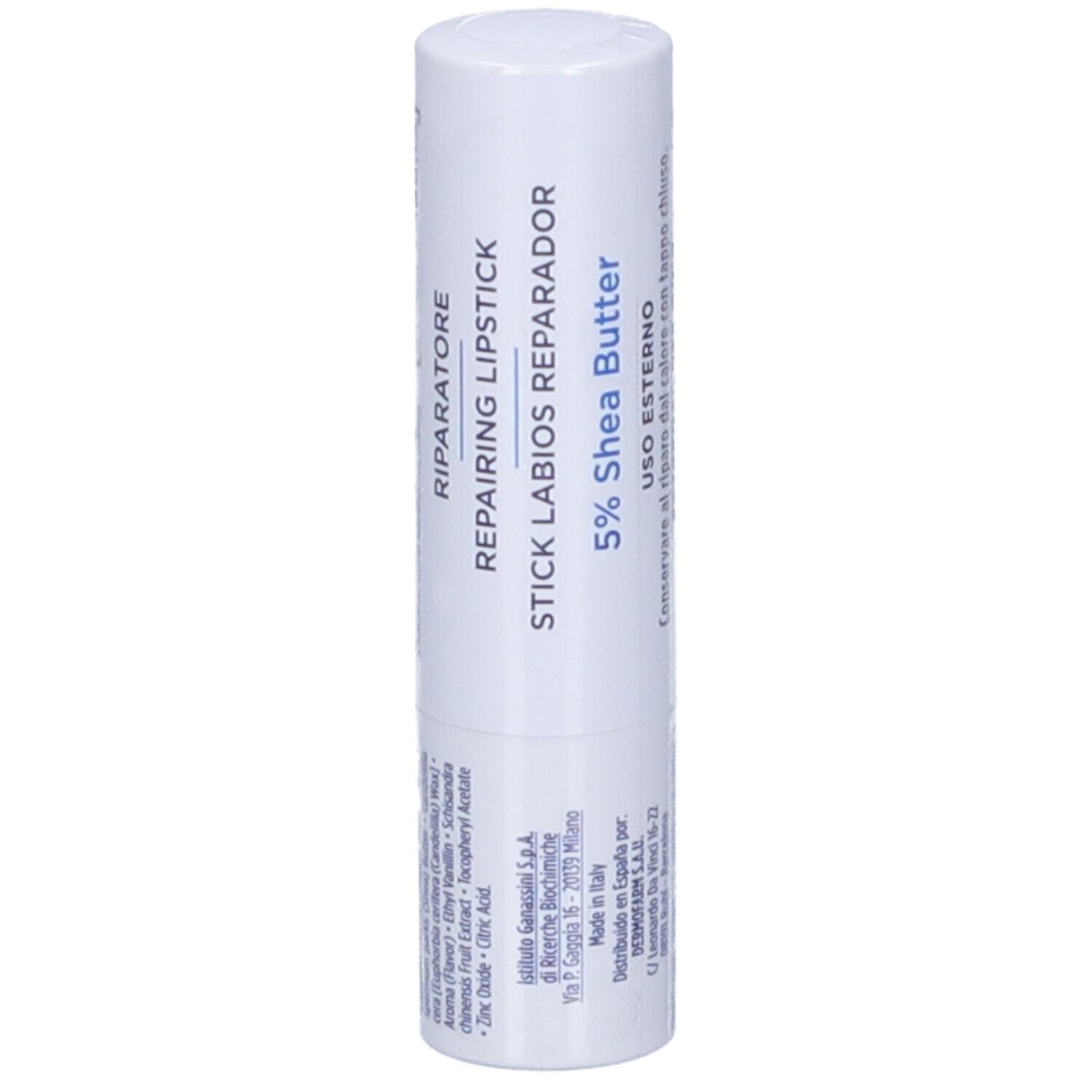 Weißer Lippenpflegestift. Aufschrift: REPAIRING LIPSTICK. 5% Shea Butter. Text über Inhaltsstoffe und Hersteller.