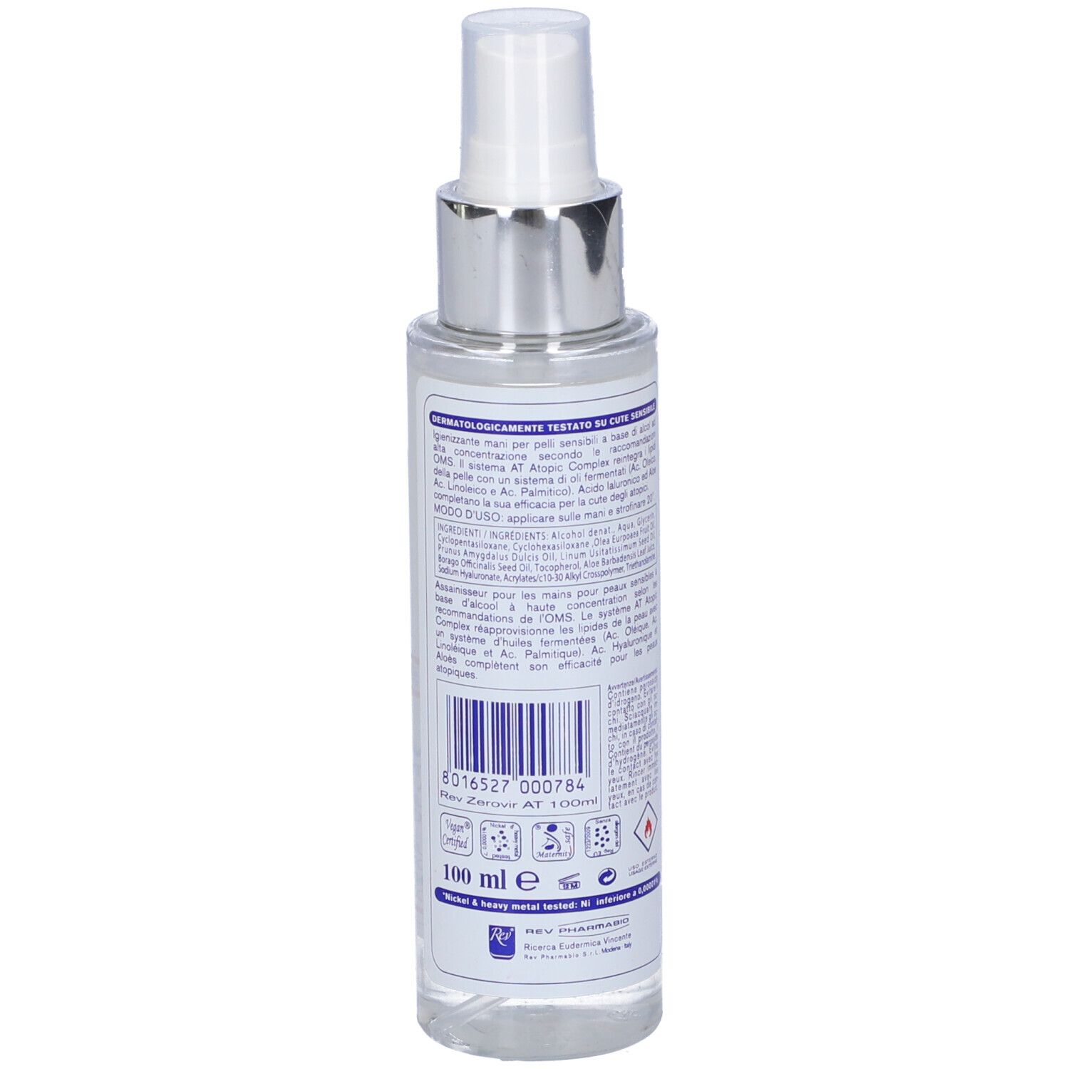 Flacone spray, retro. Etichetta bianca con testo e codice a barre. Liquido trasparente. Testina spray argentata.