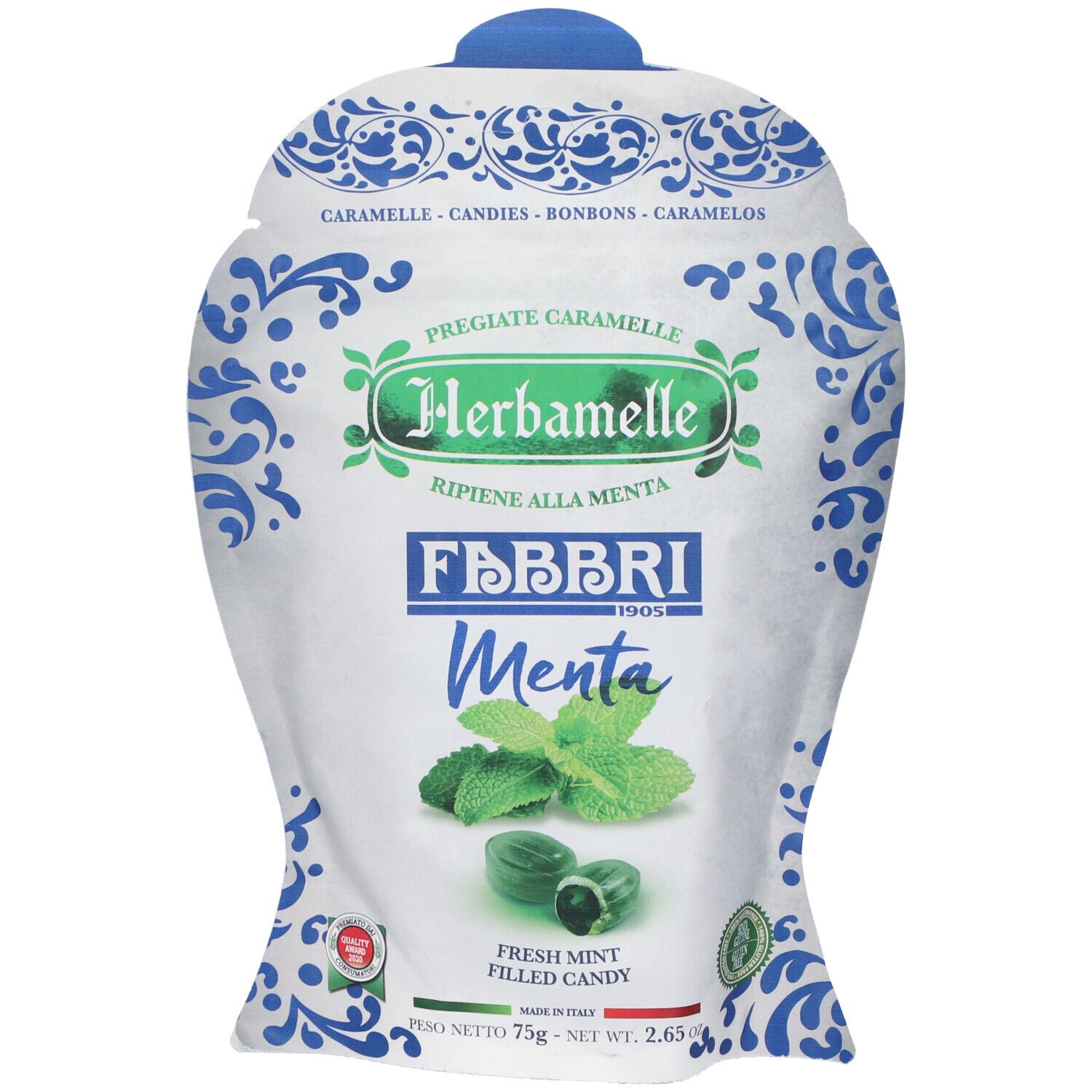 Confezione Herbamelle Menta Fabbri Caramelle. Bianca con motivi blu. Scritta verde e bianca, foglie di menta e caramelle.