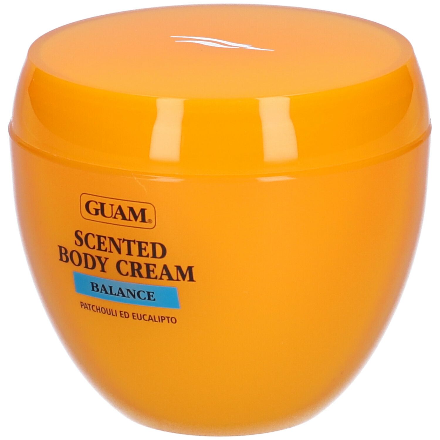 Vaso arancione con coperchio. Scritta: GUAM Scented Body Cream Balance. Patchouli ed Eucalipto.