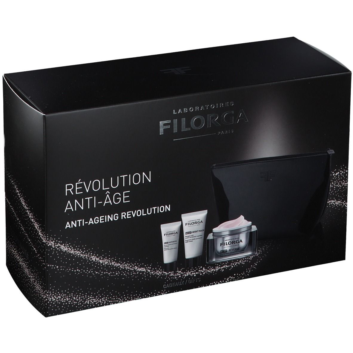 Coffret cadeau noir avec cosmétiques. Contient crèmes, tubes et trousse. Marque FILORGA. Inscription «RÉVOLUTION ANTI-ÂGE».