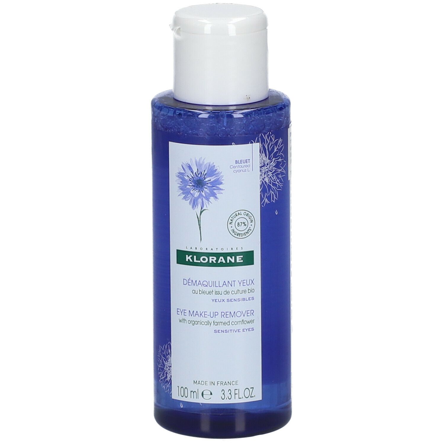 Flacone blu con tappo bianco. Scritta: KLORANE, struccante occhi. Contiene fiordaliso. Per occhi sensibili.